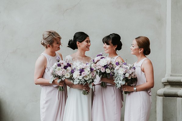 Bride and bridesmaids pastel flowers