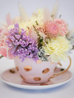 flowers in tea cup