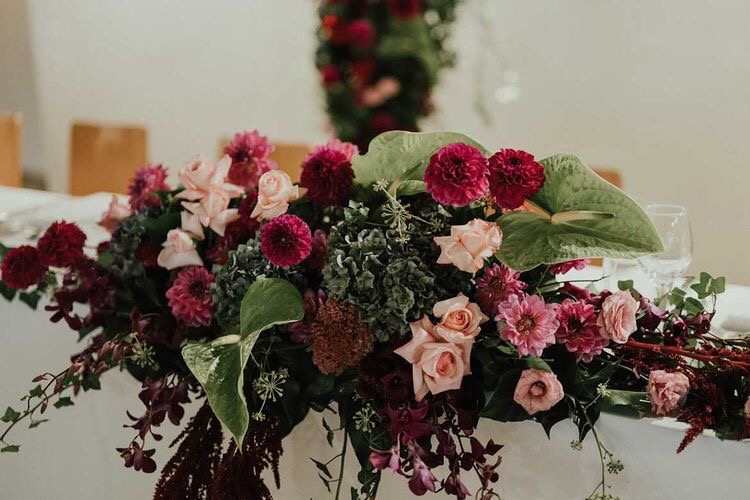Tropical, colourful bridal table flowers